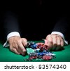 stock photo : Man playing poker