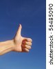 http://thumb15.shutterstock.com/thumb_small/556135/556135,1278258394,11/stock-photo-hands-on-blue-sky-background-thumbs-up-56485090.jpg